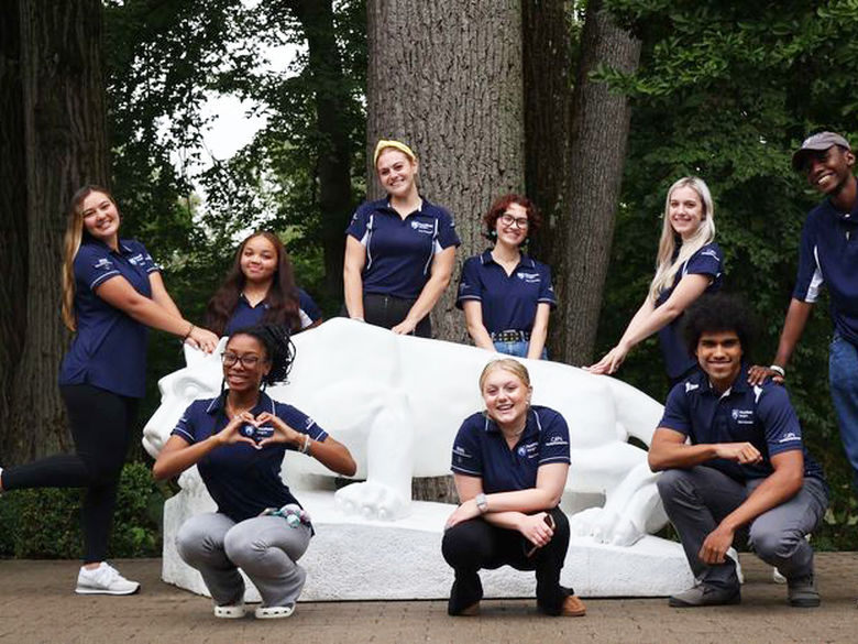 CAPS 2023 Peer Counselors around the Lion Shrine