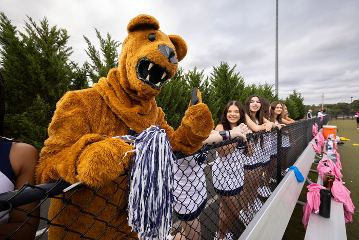 Nittany lion standing with Penn State Abington (near Philadelphia) cheerleaders