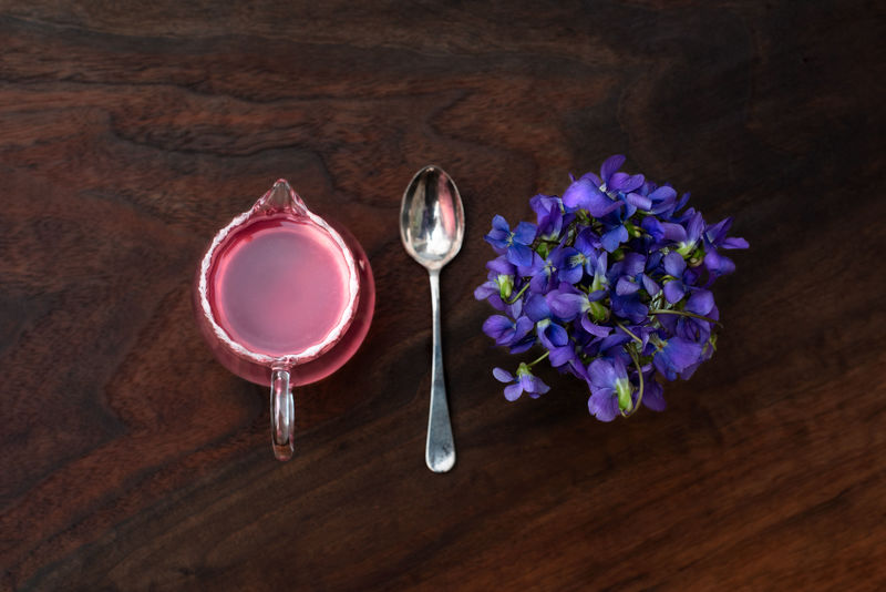 Measuring cup, spoon, and flower