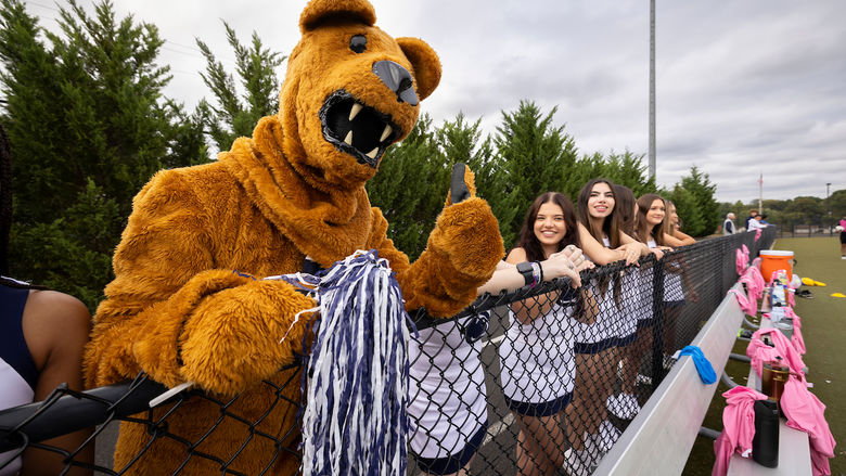 Nittany lion standing with Penn State Abington (near Philadelphia) cheerleaders