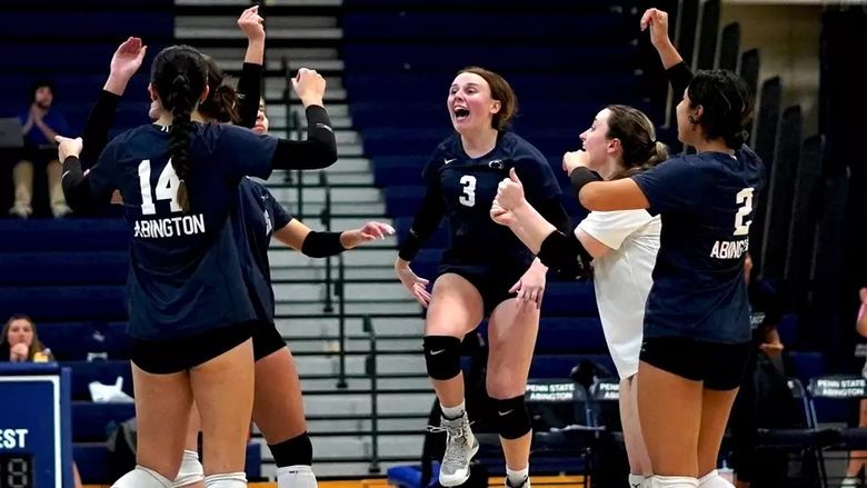 Woman volleyball players celebrating