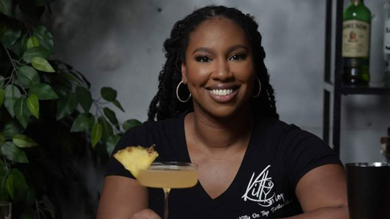 Woman, Penn State Abington(near Philadelphia) graduate, holding a drink 