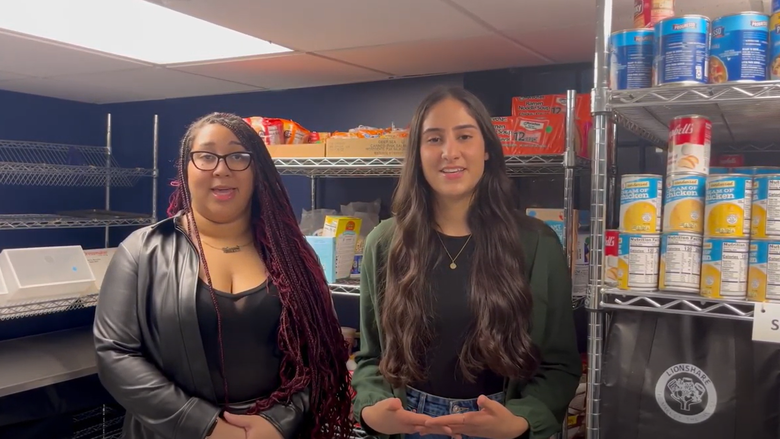 Students standing inside LionShare Pantry 