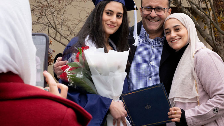 Family celebrating a new graduate