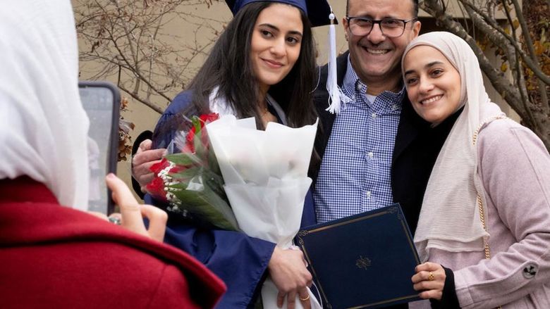 Family celebrating a new graduate