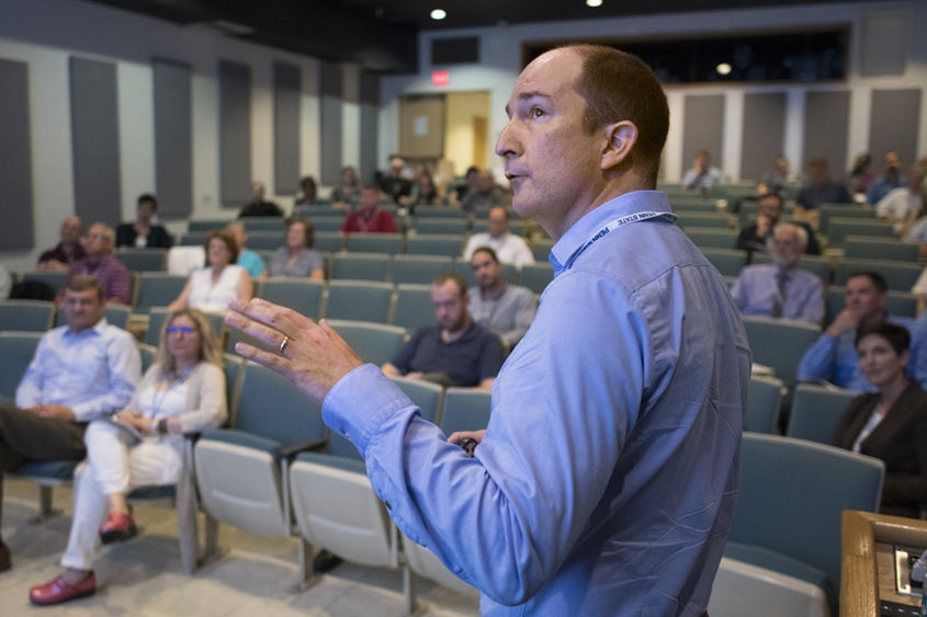 Andrew Muirhead presents his talk to faculty and staff